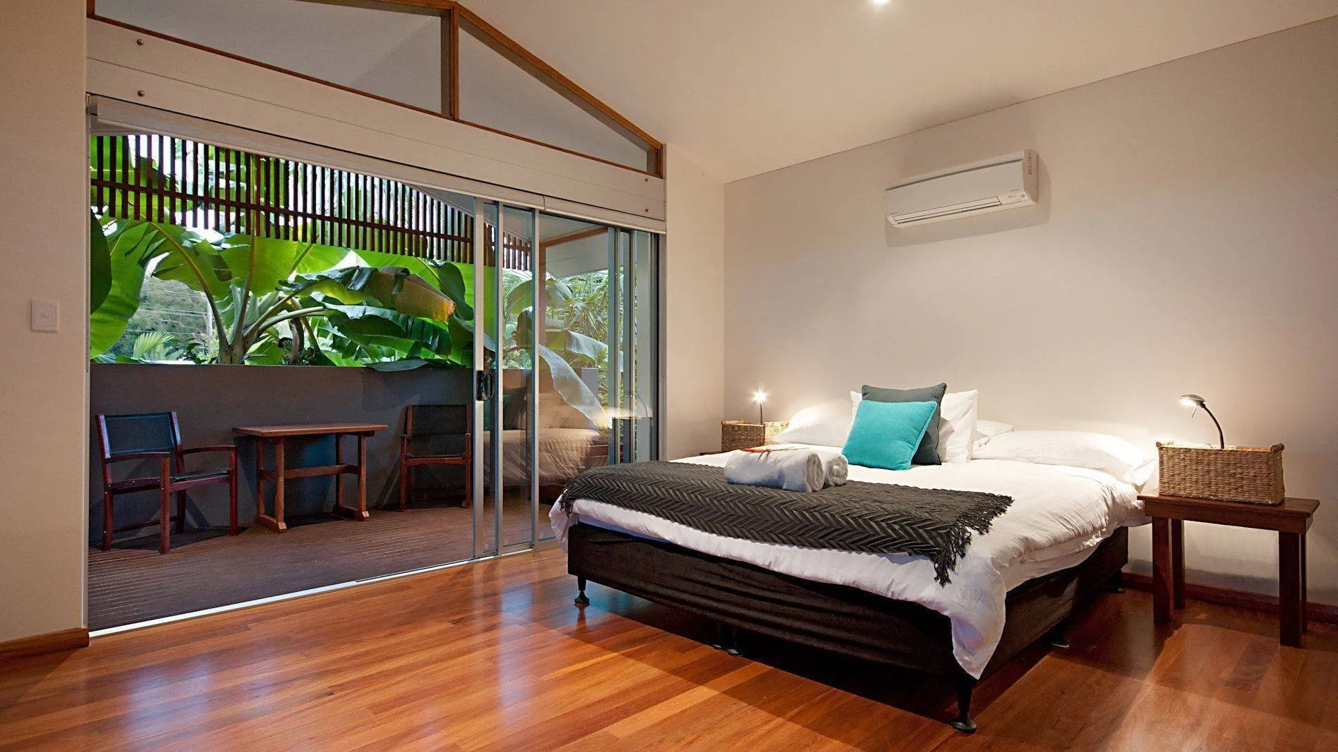 Bedroom opening onto a private garden deck